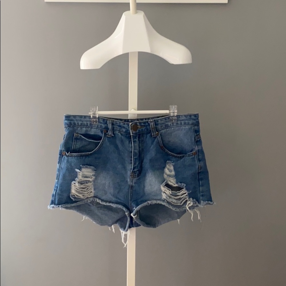 Distressed denim shorts